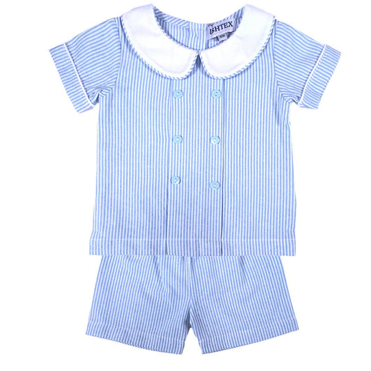 Classic blue and white seersucker boys short set with a white Peter Pan collar, double-breasted buttons, and matching shorts by Palmetto Kids Boutique.