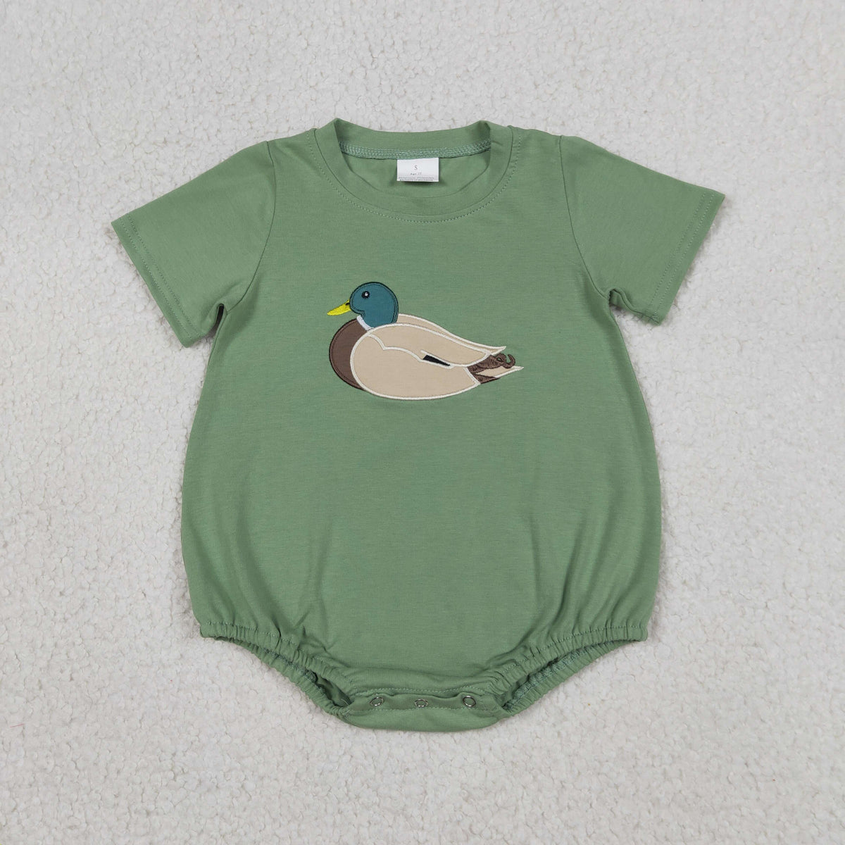 Sage green baby boy bubble romper featuring a classic mallard duck appliqué by Palmetto Kids Boutique.