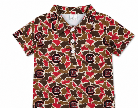 South Carolina Gamecocks boys camo polo featuring garnet camouflage, Gamecocks-inspired logos, and a classic collared design by Palmetto Kids Boutique.