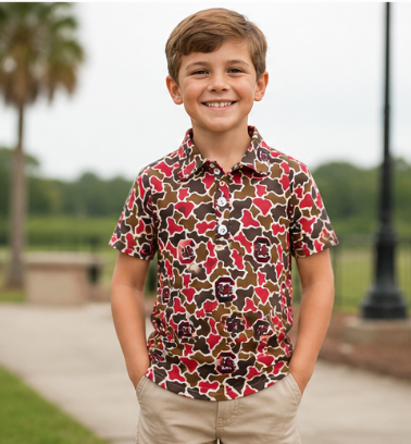 Little boy wearing a South Carolina Gamecocks camo polo at a football tailgate.
